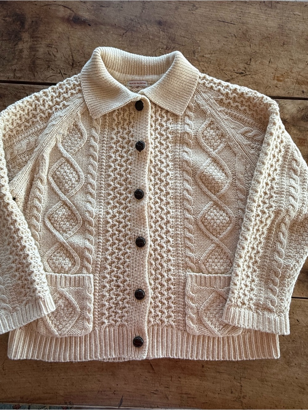 France’s Valentine Cream Cable-Knit Collared Button Sweater